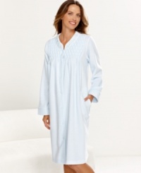 The coziness of terry cloth. Relax freely in this robe by Miss Elaine, featuring a snap front for easy on and off. The coziness of terry cloth. Relax freely in this robe by Miss Elaine, featuring a snap front for easy on and off.