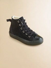 Classic Chuck Taylors in ultra-soft suede with cozy, faux shearling lining in a must-have high-top silhouette.Lace-up closureLeather upperFaux shearling liningRubber solePadded insoleImported Classic Chuck Taylors in ultra-soft suede with cozy, faux shearling lining in a must-have high-top silhouette.Lace-up closureLeather upperFaux shearling liningRubber solePadded insoleImported