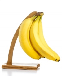 Hanging in there! Add a classic touch to your countertop with an attractive bamboo banana hanger, which puts your produce on display, keeping bananas fresh and promoting even ripening. Limited lifetime warranty. Hanging in there! Add a classic touch to your countertop with an attractive bamboo banana hanger, which puts your produce on display, keeping bananas fresh and promoting even ripening. Limited lifetime warranty.
