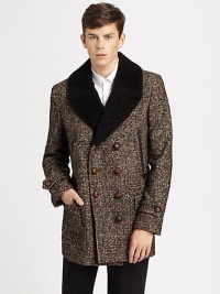 Handsome wool tweed is impeccably tailored in a sleek, double-breasted silhouette, finished with ample front pockets and a back vent.Button frontChest welt pocketWaist flap pocketsRear ventAbout 33 from shoulder to hemWool/nylon/mohair/alpacaDry cleanImported