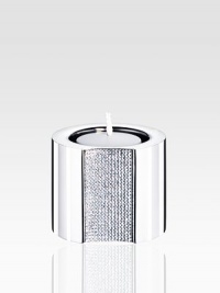 A stunning stainless steel tea light radiates timeless sophistication with an array of tiny, faceted clear crystals. Candles not included 2½H X 2 diam. Made in Austria 