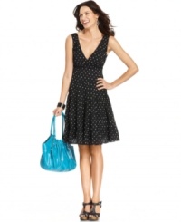 Pretty polka dots give Style&co.'s charming dress a touch of retro-inspired elegance! Pair with colorful sandals to add pop.