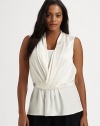 Inspired by a universally flattering Grecian style, a sleeveless silk top with a sparkling embellished waist detail. Gathered crossover frontSleevelessSide zipperEmbellishment at waistGrosgrain detail at back of waistAbout 27 from shoulder to hemSilkDry cleanImported