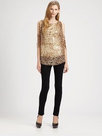 Rock the bold-shoulder trend in this sequined, silk-rich blouse with a lavish leopard print, split shoulders and airy silhouette. RoundneckSplit three-quarter sleevesLonger length hits below the hipsBody: SilkTrim: 62% viscose/35% polyethylene/3% elastaneDry cleanMade in USA of imported fabricModel shown is 5'10 (177cm) wearing US size Small. Rock the bold-shoulder trend in this sequined, silk-rich blouse with a lavish leopard print, split shoulders and airy silhouette. RoundneckSplit three-quarter sleevesLonger length hits below the hipsBody: SilkTrim: 62% viscose/35% polyethylene/3% elastaneDry cleanMade in USA of imported fabricModel shown is 5'10 (177cm) wearing US size Small.