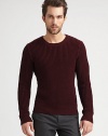 Merino wool makes this classic crewneck irresistible.CrewneckPull-on styleRibbed trimMerino woolDry cleanImported of Italian fabric