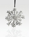 Elegant and timeless, this glistening snowflake form will beautifully adorn your tree.HandmadeNickelplate4 diam.Imported