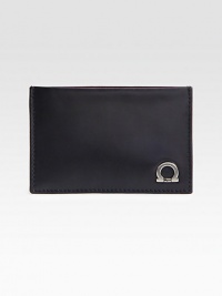 Italian calfskin leather card case with signature gancini ornament detail.Three card slotsLeather4W x 3HMade in Italy