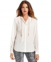 MICHAEL Michael Kors elevates this sleek petite blouse silhouette by threading a shimmering chain through the collar.