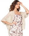 A sweet spring layering piece, this Kensie crochet-lace cardigan will add a vintage appeal to any outfit!