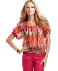 A peasant-style blouse gets a major upgrade from MICHAEL by Michael Kors. A smocked silhouette and tropical hues make this petite printed top a weekend favorite. A peasant-style blouse gets a major upgrade from MICHAEL by Michael Kors. A smocked silhouette and tropical hues make this petite printed top a weekend favorite.