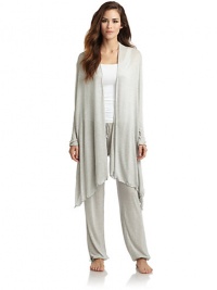 THE LOOKDraped, open frontLong sleevesTHE FITAbout 20 from shoulder to hemTHE MATERIALMicromodal rayon/cashmereCARE & ORIGINHand washMade in ItalyModel shown is 5'8 (172½cm) wearing US size Small. THE LOOKDraped, open frontLong sleevesTHE FITAbout 20 from shoulder to hemTHE MATERIALMicromodal rayon/cashmereCARE & ORIGINHand washMade in ItalyModel shown is 5'8 (172½cm) wearing US size Small.