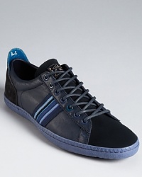 Suede and leather combine in alternating panels for an intriguing take on the everyday sneaker by Paul Smith. Suede and leather combine in alternating panels for an intriguing take on the everyday sneaker by Paul Smith.