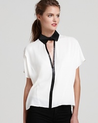 Stretch silk and supple leather meet on this color-blocked Robert Rodriguez shirt for modern luxe-the perfect piece to update minimalist separates for the office or off hours. Stretch silk and supple leather meet on this color-blocked Robert Rodriguez shirt for modern luxe-the perfect piece to update minimalist separates for the office or off hours.