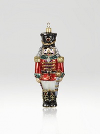 The Heritage of Jay Strongwater began as the bejeweled frame with beautiful stone settings and scrolls, becoming the source of inspiration for this season's new glass ornament collection. This ornament is mouth blown and decorated in Poland with a wonderful team of old world craftsmen. Detailed with crystals, hand applied jewel tone colors and scrolls as if it were a fine piece of jewelry.GlassCrystalMouth blownHand-painted and hand-set5.75H X 2W X 1DImported The Heritage of Jay Strongwater began as the bejeweled frame with beautiful stone settings and scrolls, becoming the source of inspiration for this season's new glass ornament collection. This ornament is mouth blown and decorated in Poland with a wonderful team of old world craftsmen. Detailed with crystals, hand applied jewel tone colors and scrolls as if it were a fine piece of jewelry.GlassCrystalMouth blownHand-painted and hand-set5.75H X 2W X 1DImported