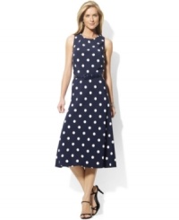 An elegant belted waist and A-line skirt flatter the body in a carefree, flirty silhouette from Lauren by Ralph Lauren. An elegant belted waist and A-line skirt flatter the body in a carefree, flirty silhouette from Lauren by Ralph Lauren.