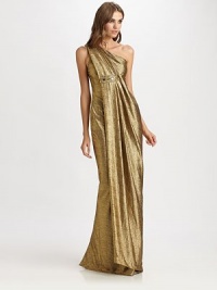 This glamorous, artfully draped design is rendered in shimmering gold lamé.Asymmmetrical necklineFront drapeBeaded detailBack pleatsConcealed back zipBack slitFully linedAbout 42 from natural waistPolyesterDry cleanImportedModel shown is 5'11 (180cm) wearing US size 4. This glamorous, artfully draped design is rendered in shimmering gold lamé.Asymmmetrical necklineFront drapeBeaded detailBack pleatsConcealed back zipBack slitFully linedAbout 42 from natural waistPolyesterDry cleanImportedModel shown is 5'11 (180cm) wearing US size 4.