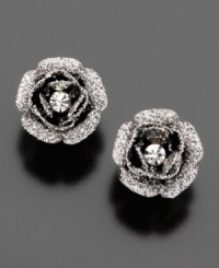 Evoke vixen-style glamour with these Betsy Johnson rose bud stud earrings. Featuring hematite accents with a glittery finish. Evoke vixen-style glamour with these Betsy Johnson rose bud stud earrings. Featuring hematite accents with a glittery finish.