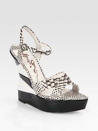 Two-tone cork wedge has skinny snake-print leather straps and an adjustable slingback. Painted cork wedge, 5½ (140mm)Painted cork platform, 1 (25mm)Compares to a 4½ heel (115mm)Snake-print leather upperLeather lining and solePadded insoleImportedOUR FIT MODEL RECOMMENDS ordering one half size up as this style runs small. Two-tone cork wedge has skinny snake-print leather straps and an adjustable slingback. Painted cork wedge, 5½ (140mm)Painted cork platform, 1 (25mm)Compares to a 4½ heel (115mm)Snake-print leather upperLeather lining and solePadded insoleImportedOUR FIT MODEL RECOMMENDS ordering one half size up as this style runs small.