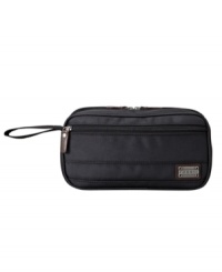 This nylon shaving kit is a modern addition to his travel accessories that adds an element of sleek style. This nylon shaving kit is a modern addition to his travel accessories that adds an element of sleek style.