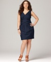 Flaunt a slender looking figure with DKNYC's sleeveless plus size dress, featuring a flattering cross front design!