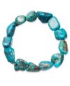 Add bohemian flavor to your look in Avalonia Road's chic stretch bracelet. Crafted from asymmetrical turquoise nuggets (25 ct. t.w.), bracelet stretches to fit wrist. Approximate length: 7 inches.