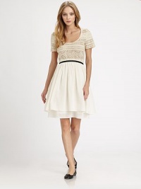 This charming frock pairs delicate crochet with gauzy tiered cotton for an airy, effortless look.ScoopneckShort sleevesRibbon detail at waistFull gathered skirtTiered hemBack keyhole closureAbout 21 from shoulder to hemSilkDry cleanMade in Italy of imported fabricModel shown is 5'10 (177cm) wearing US size 4. This charming frock pairs delicate crochet with gauzy tiered cotton for an airy, effortless look.ScoopneckShort sleevesRibbon detail at waistFull gathered skirtTiered hemBack keyhole closureAbout 21 from shoulder to hemSilkDry cleanMade in Italy of imported fabricModel shown is 5'10 (177cm) wearing US size 4.