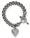 Juicy Couture's signature starter bracelet feauturing a pavé heart charm with logo banner.