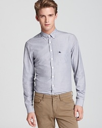 Casual polish defines this crisp cotton button-down from Burberry Brit, a high dose of modern refinement with a slim fit silhouette. Casual polish defines this crisp cotton button-down from Burberry Brit, a high dose of modern refinement with a slim fit silhouette.