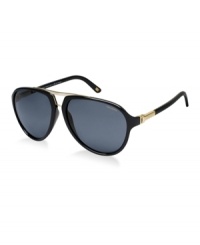 Unexpected style, this pilot look is Versace at its best. Look confident and cool in these black frames with grey, polarized lenses. Gold details at each temple add a unique element. Unexpected style, this pilot look is Versace at its best. Look confident and cool in these black frames with grey, polarized lenses. Gold details at each temple add a unique element.