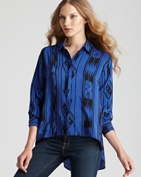 Boasting an eclectic print, this airy Amanda Uprichard shirt of rich silk takes on the high/low trend and masters it. Boasting an eclectic print, this airy Amanda Uprichard shirt of rich silk takes on the high/low trend and masters it.