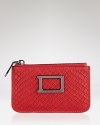 Key to every cool-girl's look? Petite yet punchy accessories like this leather key pouch from MARC BY MARC JACOBS.