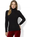 A wide cable-knit construction lends cozy appeal to Lauren Jeans Co.'s soft wool-blend sweater.