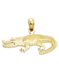 Give your look a little extra bite. This polished and textured alligator charm is crafted in 14k gold. Chain not included. Approximate length: 3/5 inch. Approximate width: 9/10 inch. Give your look a little extra bite. This polished and textured alligator charm is crafted in 14k gold. Chain not included. Approximate length: 3/5 inch. Approximate width: 9/10 inch.