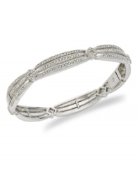 Triple the glamour. Eliot Danori's glistening bangle bracelet features a three row design accented by sparkling glass crystals. Set in rhodium-plated mixed metal. Approximate diameter: 2-1/4 inches. Triple the glamour. Eliot Danori's glistening bangle bracelet features a three row design accented by sparkling glass crystals. Set in rhodium-plated mixed metal. Approximate diameter: 2-1/4 inches.