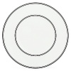 First at Bloomingdale's. These bold black and white patterns are made to mix and match. Choose five-piece place settings in floral Dogwood Point, banded Nag's Head or striped Pinney's Beach. Nag's Head shown here.