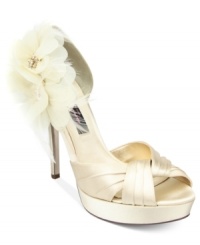 Between the d'Orsay cut and the floral and rhinestone details on the side, Nina's Maybell platform evening pumps are decorated with the prettiest details. Between the d'Orsay cut and the floral and rhinestone details on the side, Nina's Maybell platform evening pumps are decorated with the prettiest details.