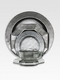 A unique mottling technique lends a hand-thumbed, hammered design to a beautiful metallic stoneware server and decorative charger with the look of an old-world favorite. From the Pewter Collection14 diam.Ceramic stonewareDishwasher safeImported A unique mottling technique lends a hand-thumbed, hammered design to a beautiful metallic stoneware server and decorative charger with the look of an old-world favorite. From the Pewter Collection14 diam.Ceramic stonewareDishwasher safeImported