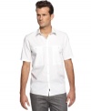 Work your weekend look with extra polish wearing this short-sleeved shirt from Calvin Klein. (Clearance)