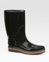 Rubber matte finish rainboot with interlocking G and signature stripe detail.Shaft, 12Leg circumference, 17Rubber upperLeather liningPadded insoleRubber soleMade in ItalyOUR FIT MODEL RECOMMENDS ordering true whole size; ½ sizes should order the next whole size down. 