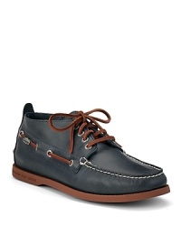 Take on a casual look with Sperry Topsider's chukka shoes, rendered with a lace-up vamp, contrast leather stitching and sole. Take on a casual look with Sperry Topsider's chukka shoes, rendered with a lace-up vamp, contrast leather stitching and sole.