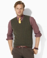 A classic sweater vest is the hallmark of preppy style in luxurious cable-knit merino lambswool. A classic sweater vest is the hallmark of preppy style in luxurious cable-knit merino lambswool.