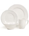 Elegant is an understatement with the Blanc Brigette place setting by Versailles Maison. Raised dots and a soft white finish adorn classic silhouettes in beautifully distressed earthenware.