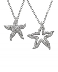 Spruce up your summer wardrobe with a little nautical shine. Swarovski's double starfish pendant features one cut-out and one solid starfish decorated in glittering round-cut crystals. Crafted in silver tone mixed metal. Approximate length: 15 inches. Approximate drop: 1-1/4 inches. Spruce up your summer wardrobe with a little nautical shine. Swarovski's double starfish pendant features one cut-out and one solid starfish decorated in glittering round-cut crystals. Crafted in silver tone mixed metal. Approximate length: 15 inches. Approximate drop: 1-1/4 inches.
