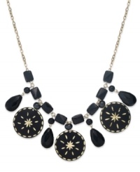 A bold example of modern style, this Style&co. statement necklace features jet-colored glass beads and drop discs with intricate diamond-cut detail. Crafted in gold tone mixed metal. Approximate length: 18 inches + 2-inch extender. Approximate drop: 5 inches. A bold example of modern style, this Style&co. statement necklace features jet-colored glass beads and drop discs with intricate diamond-cut detail. Crafted in gold tone mixed metal. Approximate length: 18 inches + 2-inch extender. Approximate drop: 5 inches.