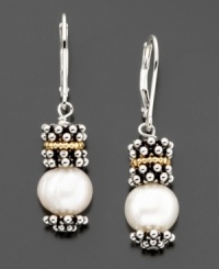 A glistening pearl (8.5mm) is elegantly situated between sterling silver beads and 14K gold accents in these wear-ready earrings. A glistening pearl (8.5mm) is elegantly situated between sterling silver beads and 14K gold accents in these wear-ready earrings.