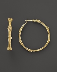 Elegant hoop earrings in 18K yellow gold accented with a diamond bezel. From Judith Ripka. Elegant hoop earrings in 18K yellow gold accented with a diamond bezel. From Judith Ripka.