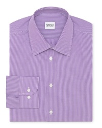 The gingham pattern of this exceptional dress shirt balances classic refinement with modern sophistication, and is rendered in superior cotton for classic comfort. The gingham pattern of this exceptional dress shirt balances classic refinement with modern sophistication, and is rendered in superior cotton for classic comfort.