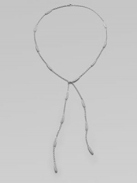 EXCLUSIVELY AT SAKS. This long, elegant chain, stationed with sparkling pavé cystals, has vintage-glam appeal.Crystals Rhodium plated Chain length, about 24 Imported