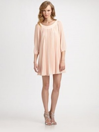 Soft airy chiffon, tailored in a swingy silhouette with crisp, allover pleats and feminine blouson sleeves.Banded scoopneckThree-quarter blouson sleevesA-lineAllover pleatsFully linedAbout 18 from natural waistPolyesterDry cleanImportedModel shown is 5'11 (180cm) wearing US size 4. Soft airy chiffon, tailored in a swingy silhouette with crisp, allover pleats and feminine blouson sleeves.Banded scoopneckThree-quarter blouson sleevesA-lineAllover pleatsFully linedAbout 18 from natural waistPolyesterDry cleanImportedModel shown is 5'11 (180cm) wearing US size 4.