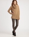 Slightly oversized and styled with a cozy cowlneck, all in a lush blend of wool, alpaca and camel.CowlneckDropped shouldersLong sleevesPullover style50% wool/20% nylon/20% alpaca/10% camelDry cleanImported of Italian fabricModel shown is 5'11 (180cm) wearing US size Small.